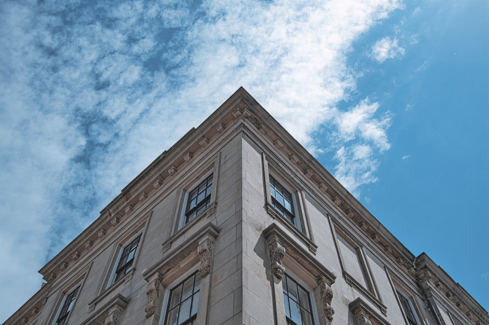 brown concrete building under blue sky during daytime