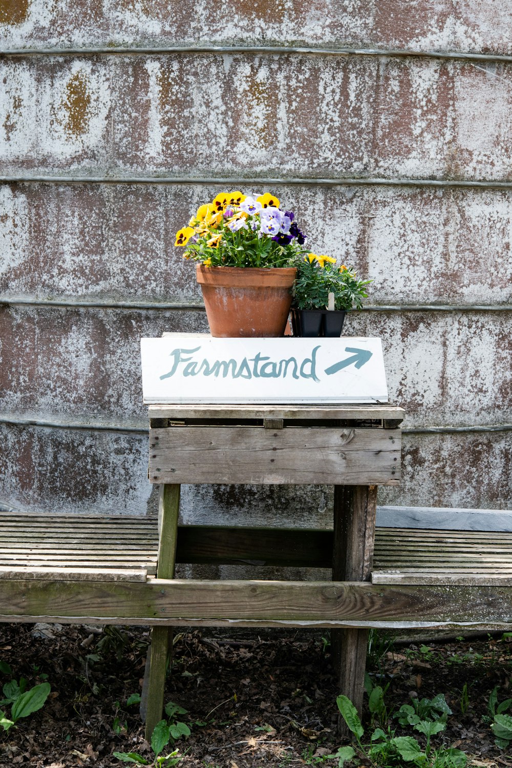 brown wooden table with white and black box