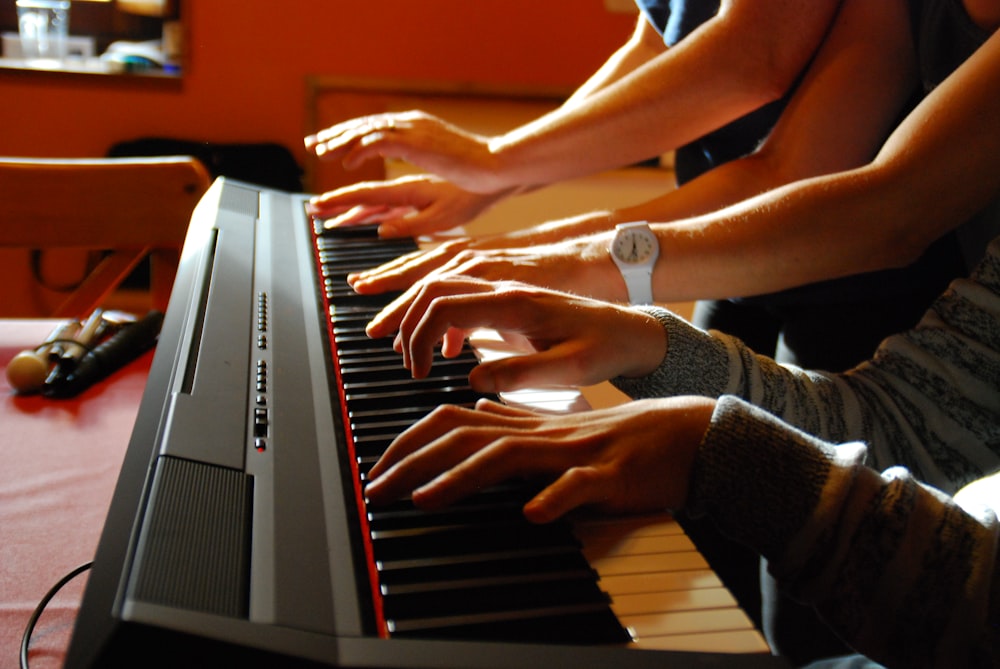 person playing black and white piano