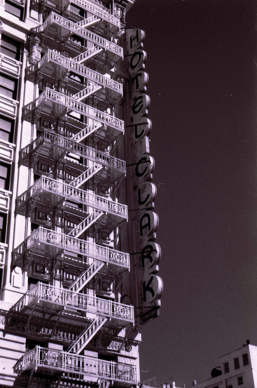 grayscale photo of high rise building