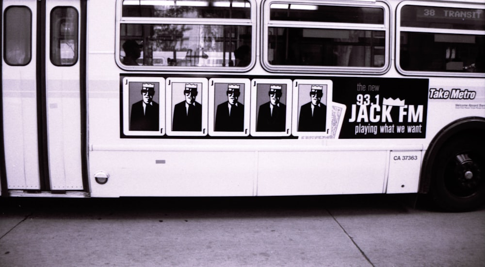 white and black bus with people