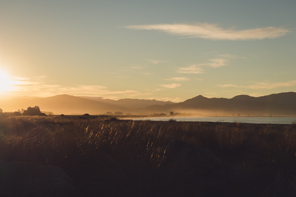 silhouette of mountain during sunset