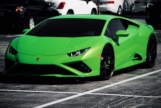 green lamborghini aventador parked on parking lot