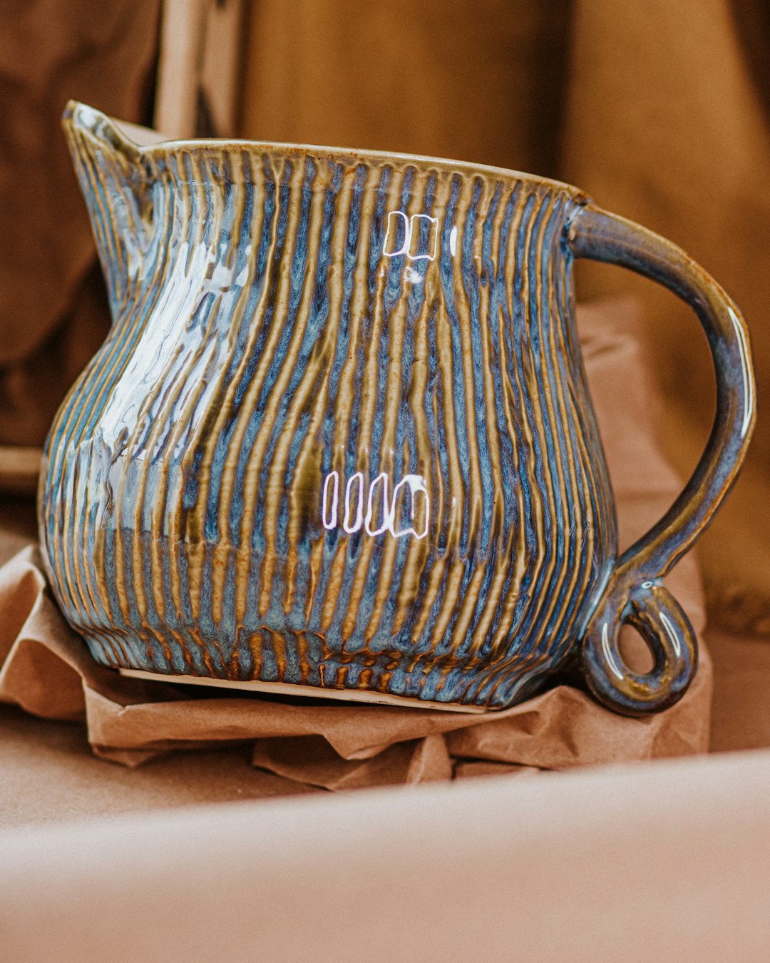 blue and brown ceramic vase
