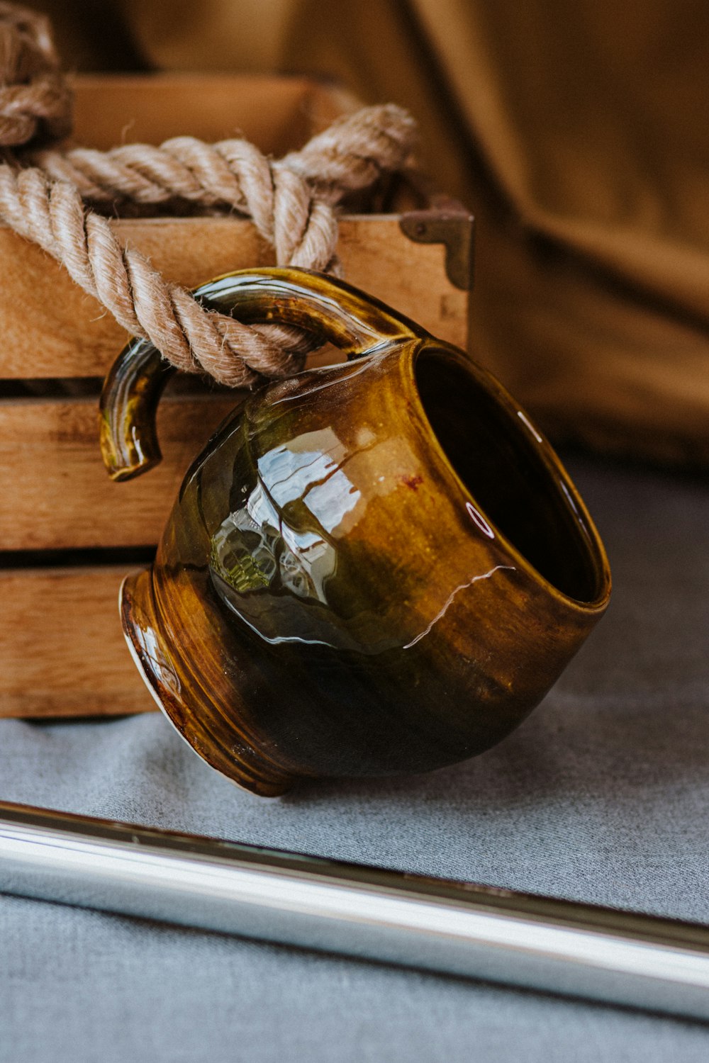 brown and green ceramic vase