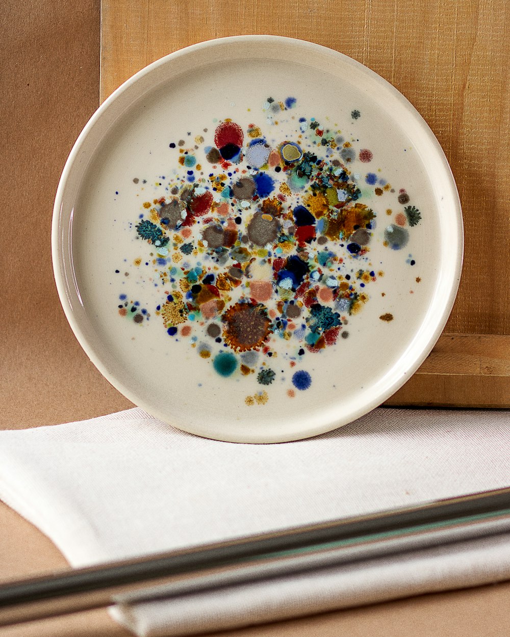 white ceramic bowl with assorted beads