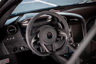 black and silver steering wheel