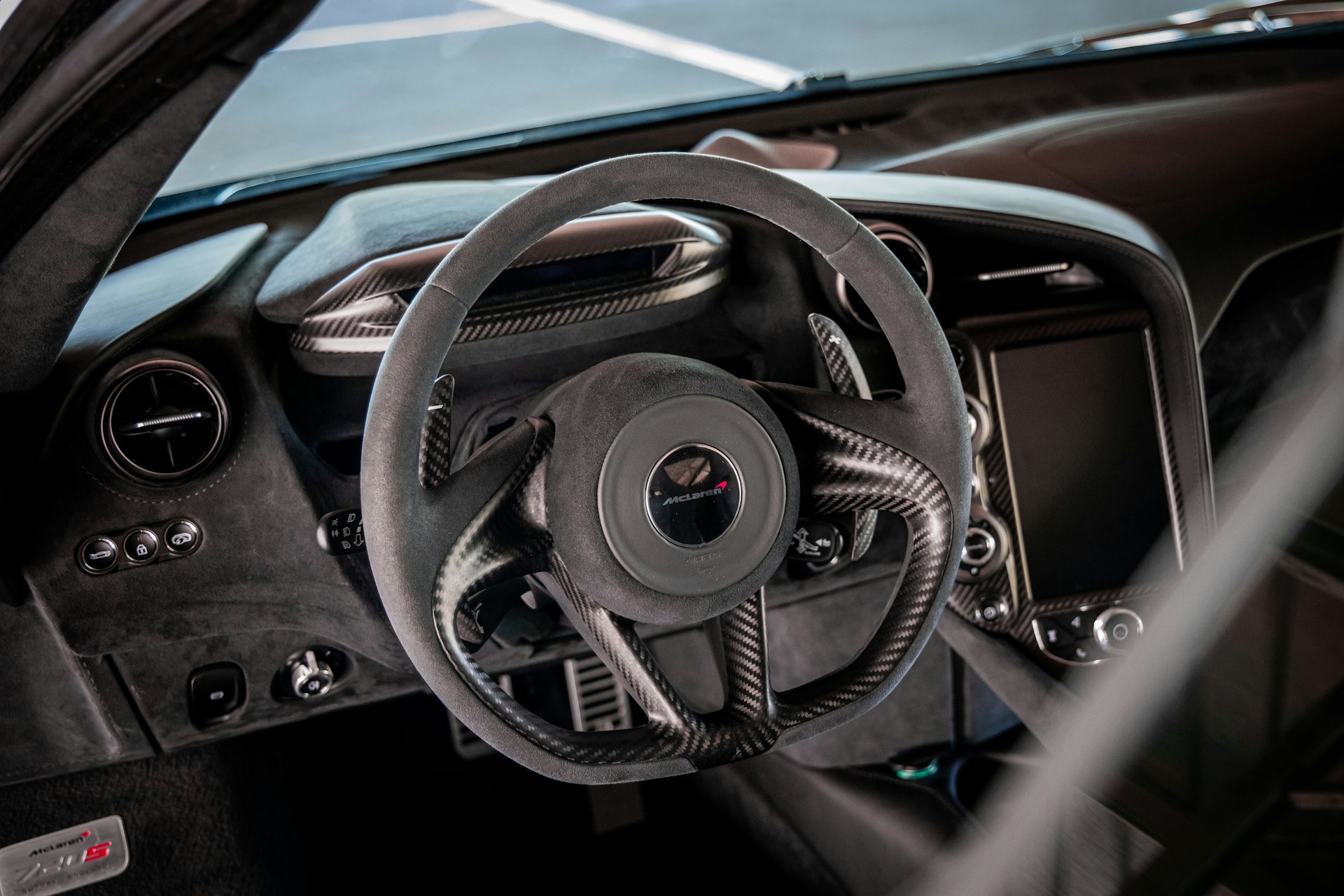 black and silver steering wheel