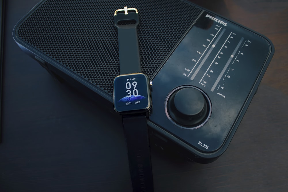black and blue digital watch