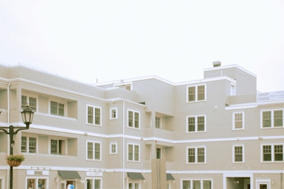white concrete building under white sky during daytime
