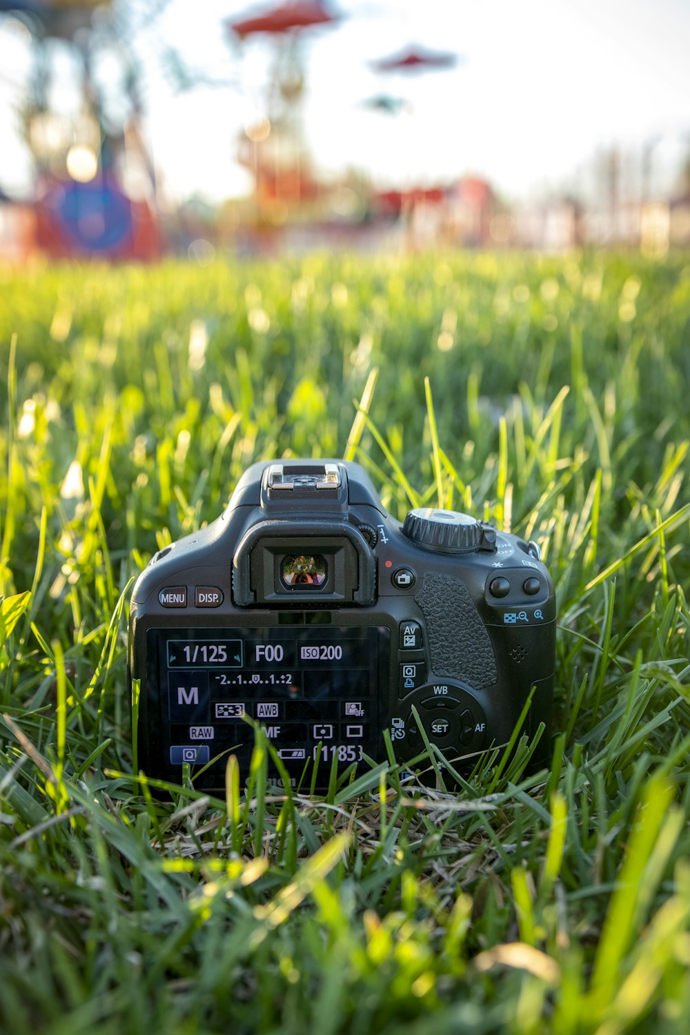 black nikon dslr camera on green grass during daytime photo – Free Camera  Image on Unsplash
