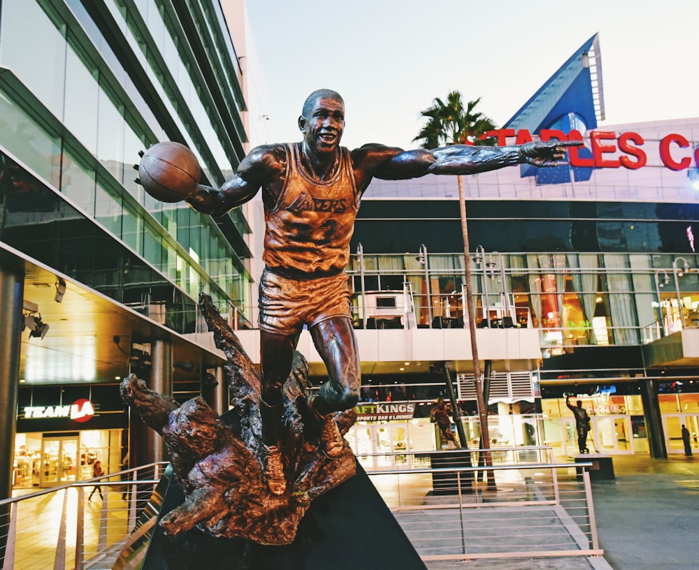 man in tiger costume statue