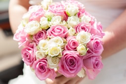 pink roses on white table