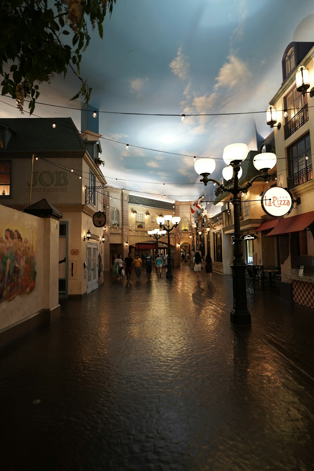 people walking on street during night time