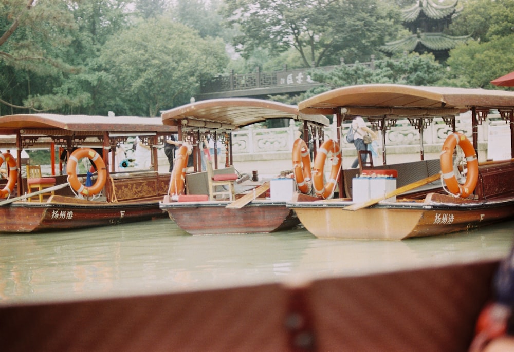 people riding on boat during daytime