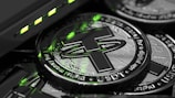 a close up of a pile of crypt coins