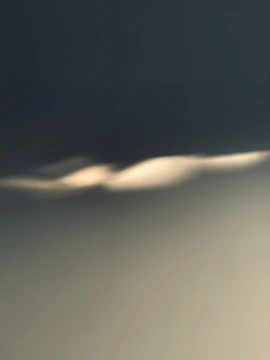 Abstract monochrome cover art with blurred glassmorphism effect and subtle gradients.