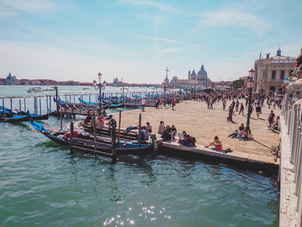 people riding on boat on water during daytime