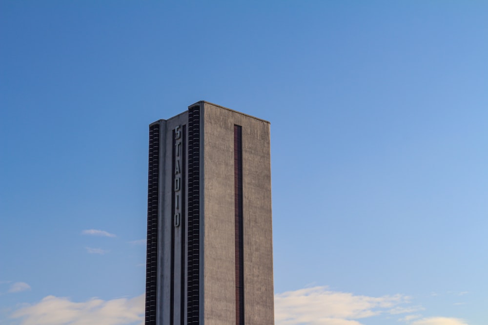 brown concrete building under blue sky during daytime