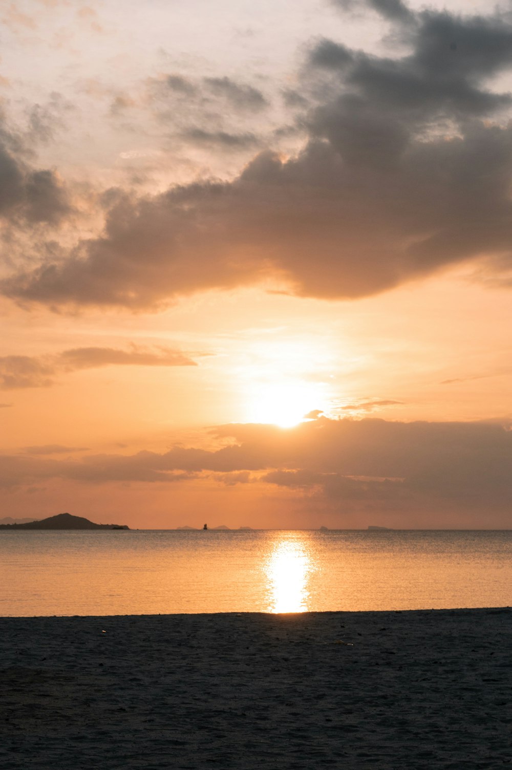 body of water during sunset