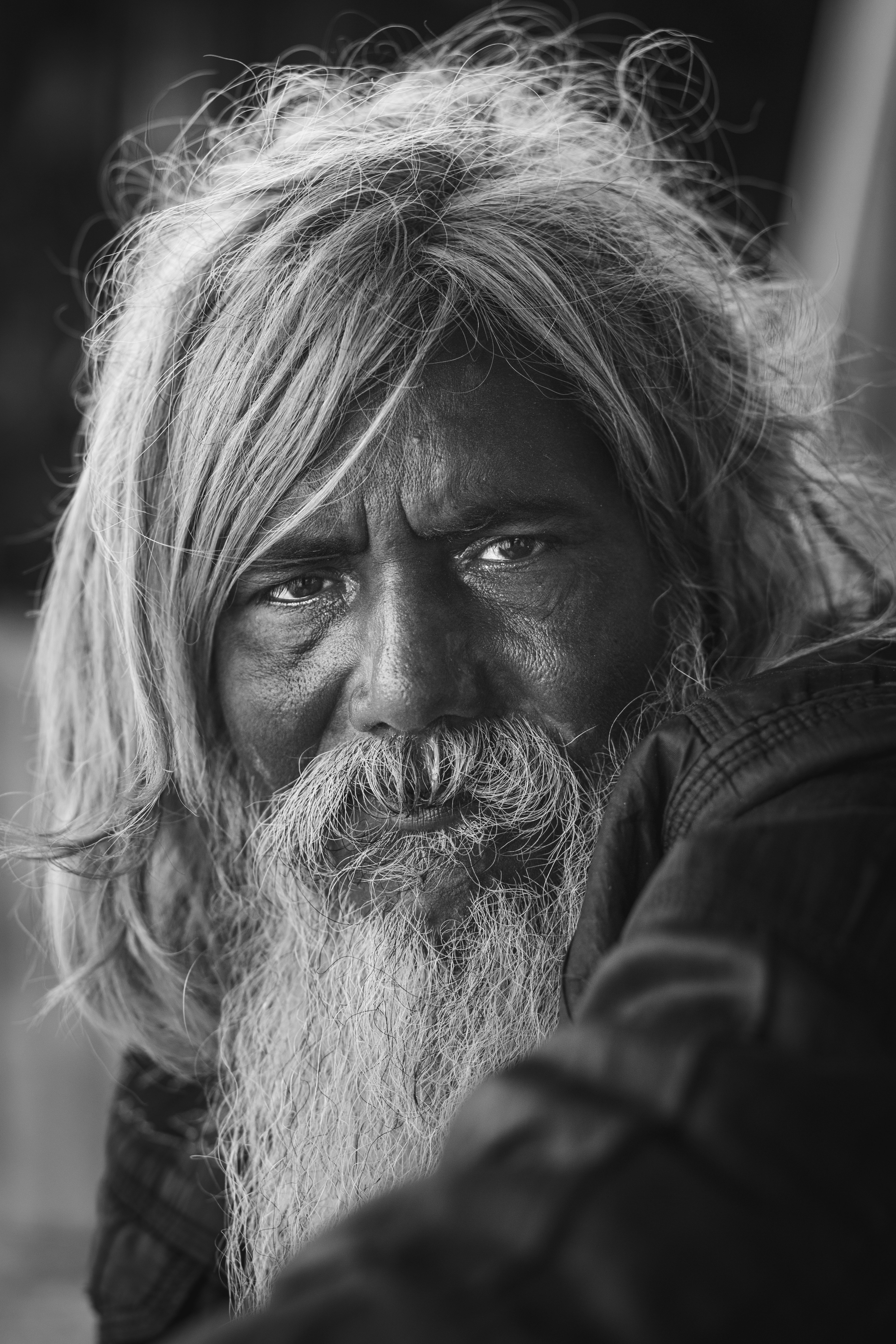 grayscale photo of man in black jacket photo – Free Human Image on Unsplash
