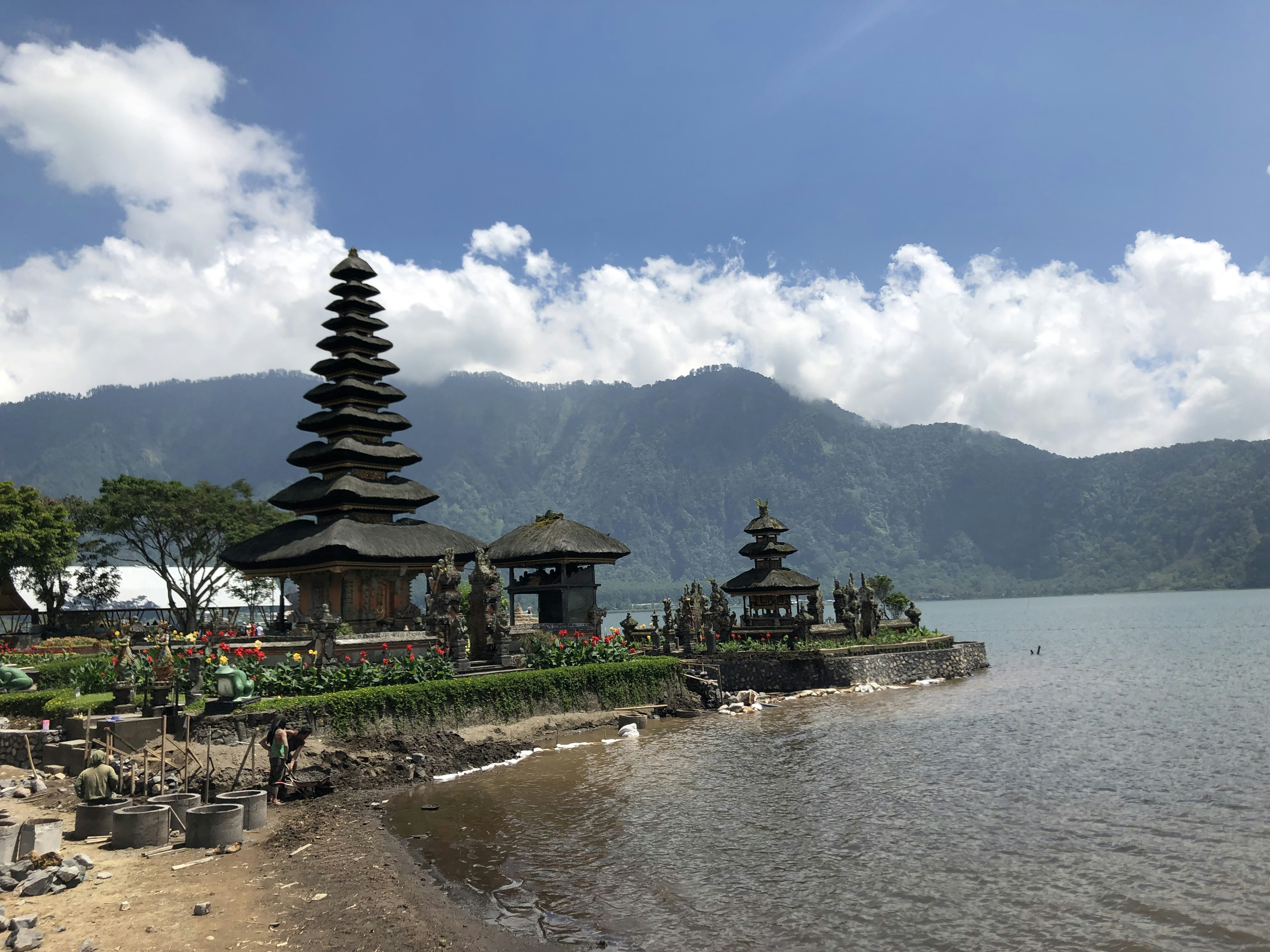 Beach and mountains in Bali representing remote work in Indonesia