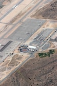 Aerial view of an airport with planes on the runway.