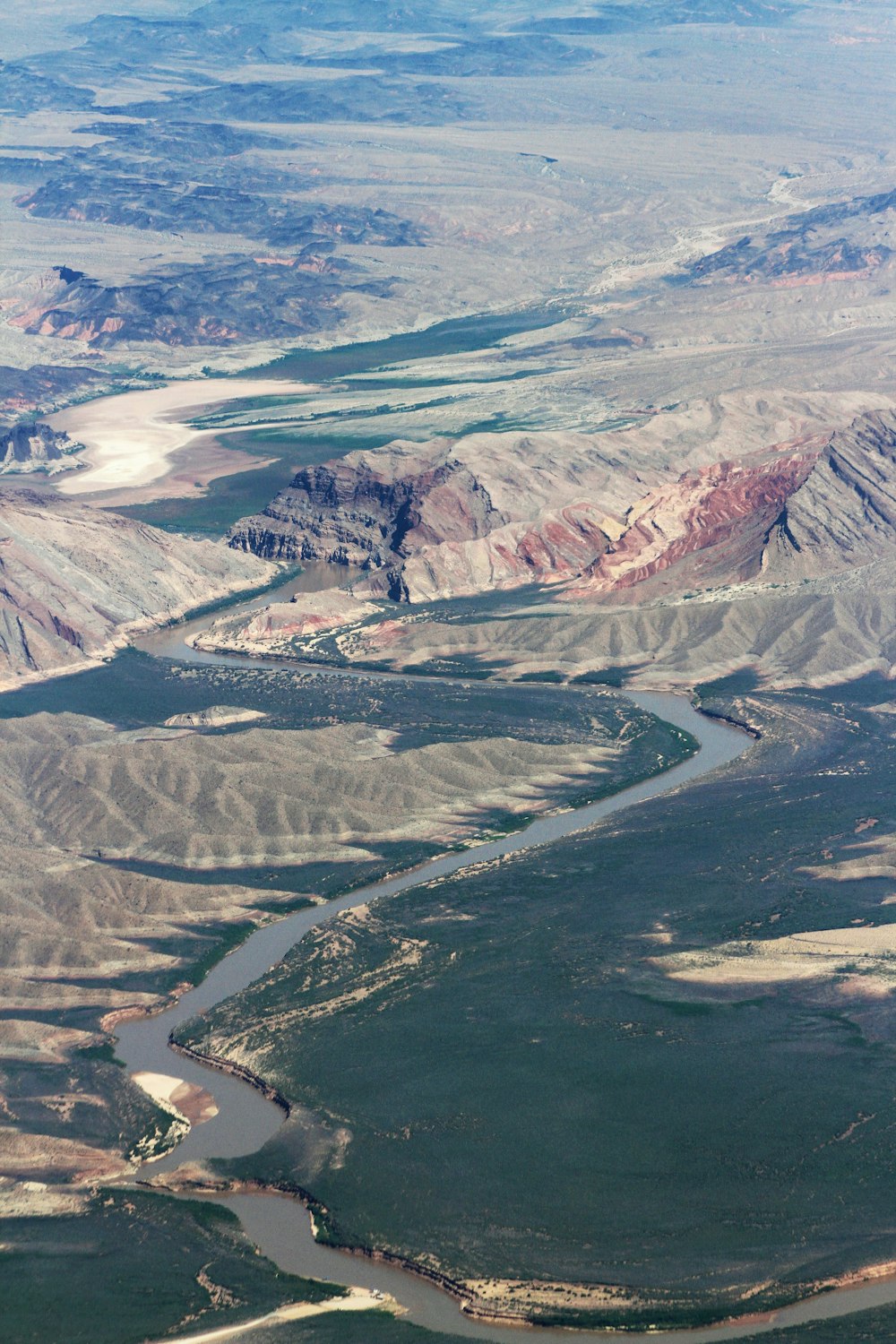 aerial view of snow covered mountains during daytime