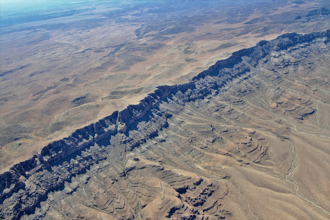 aerial view of gray and white mountains during daytime