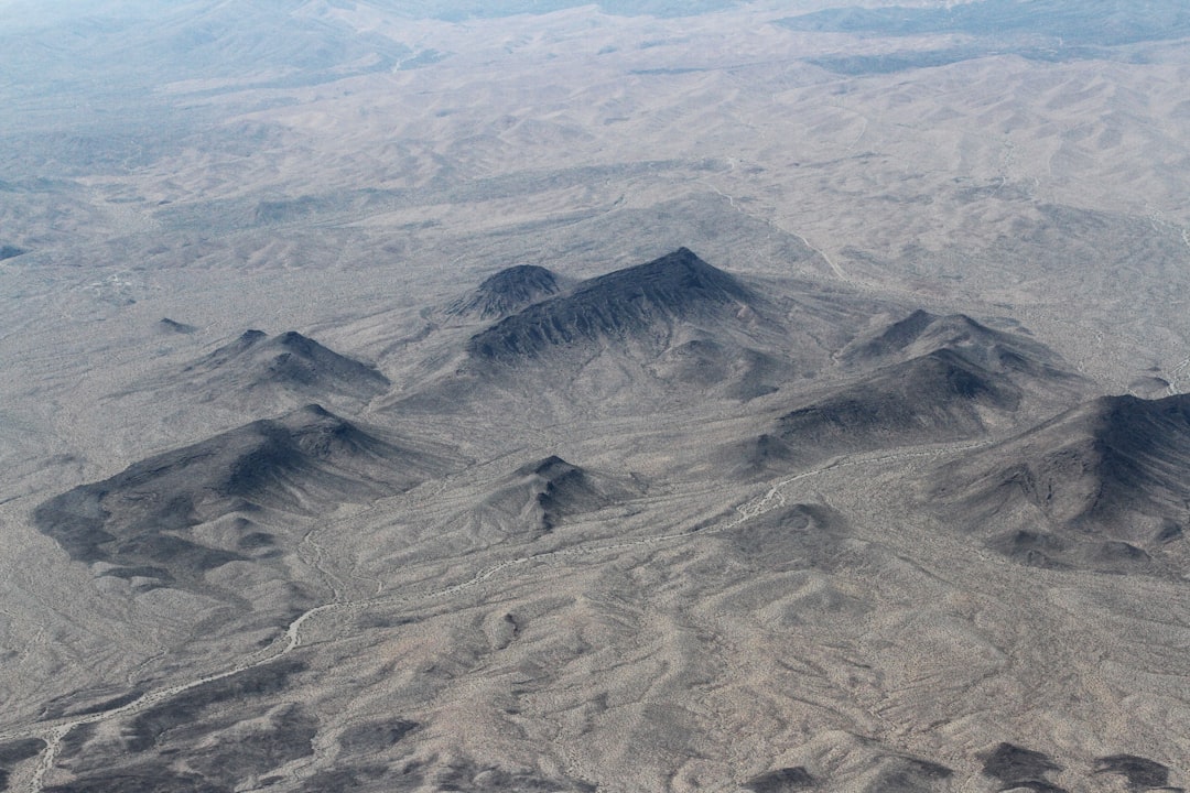 gray and white mountain under blue sky during daytime