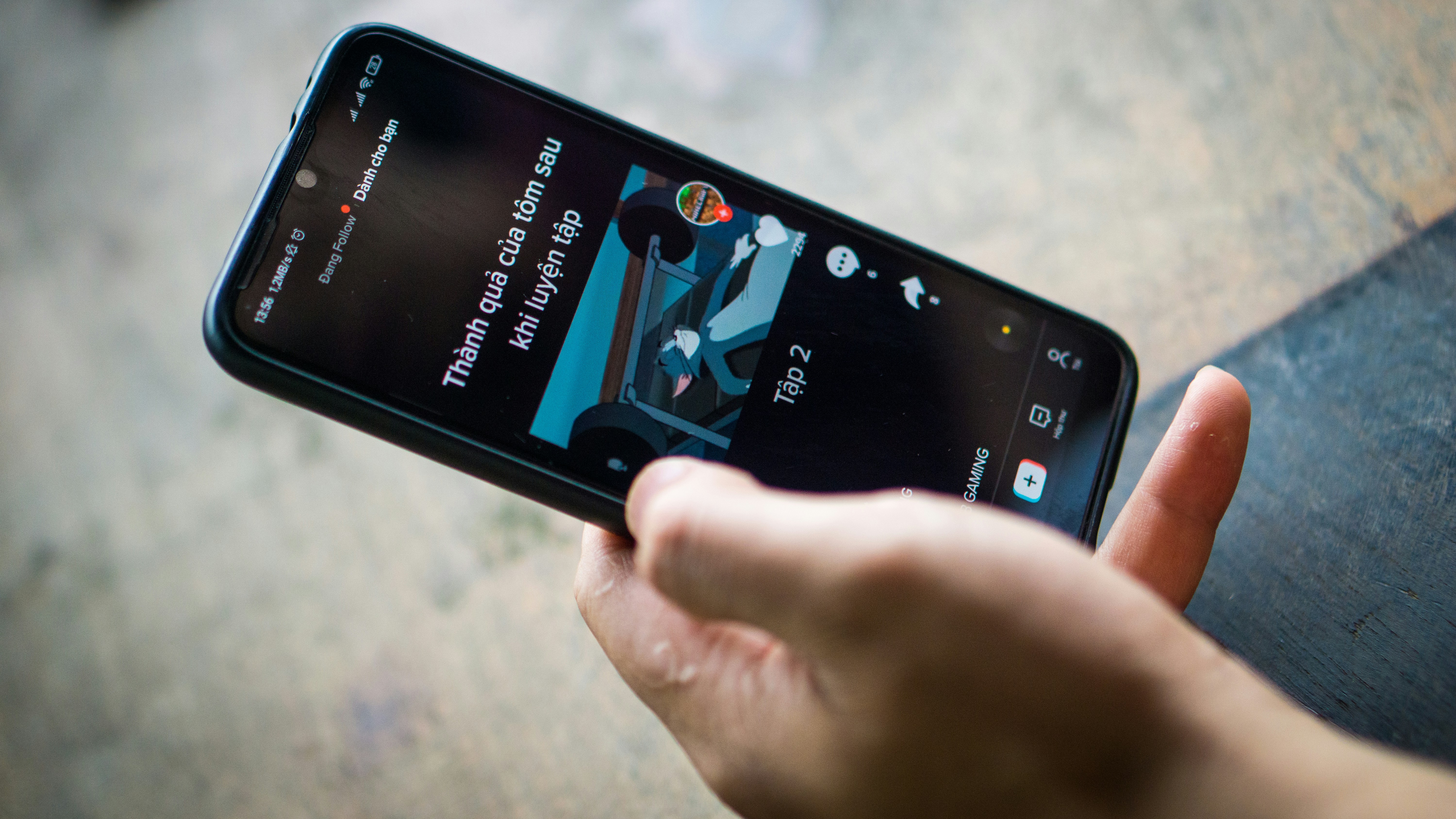 person holding black samsung android smartphone