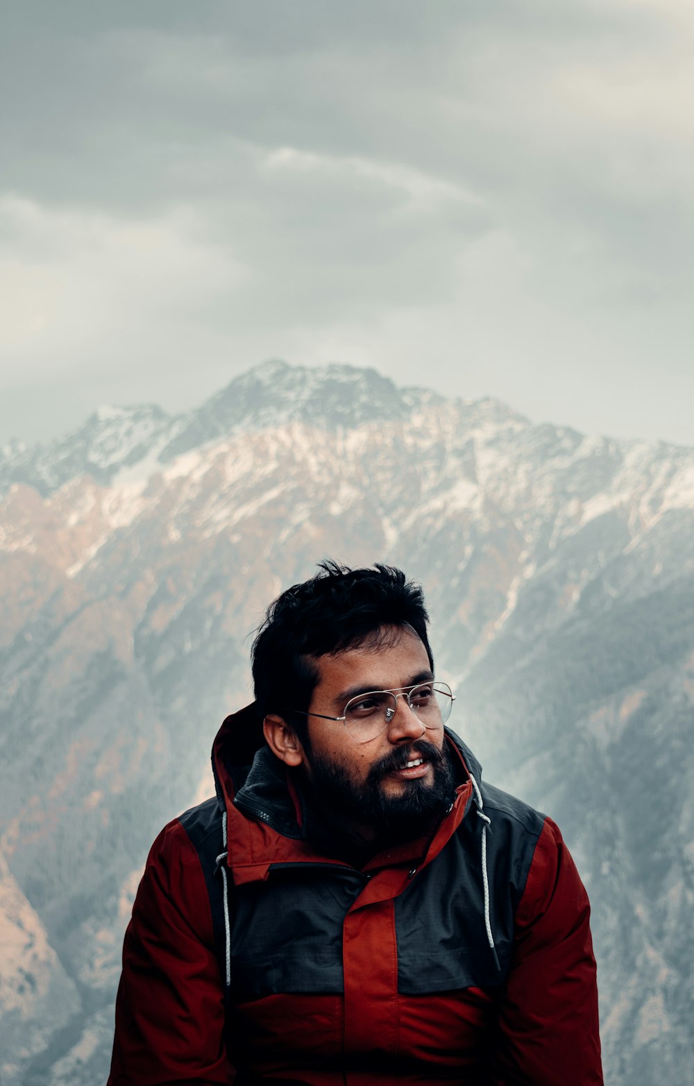 man in red and black jacket