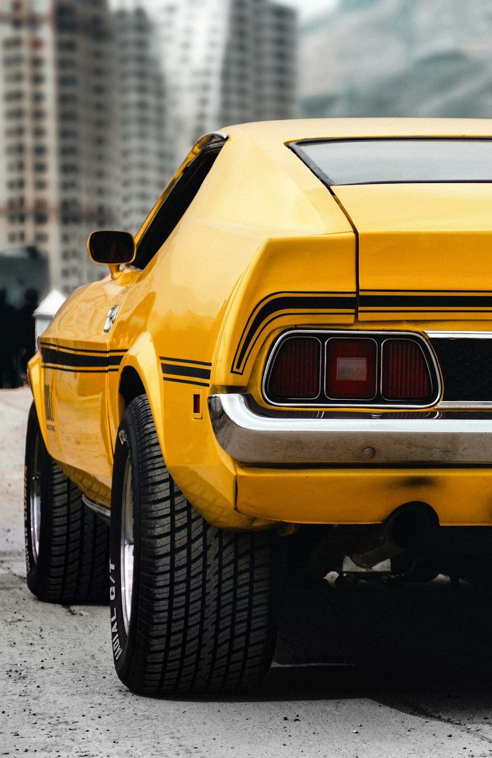 yellow car on road during daytime