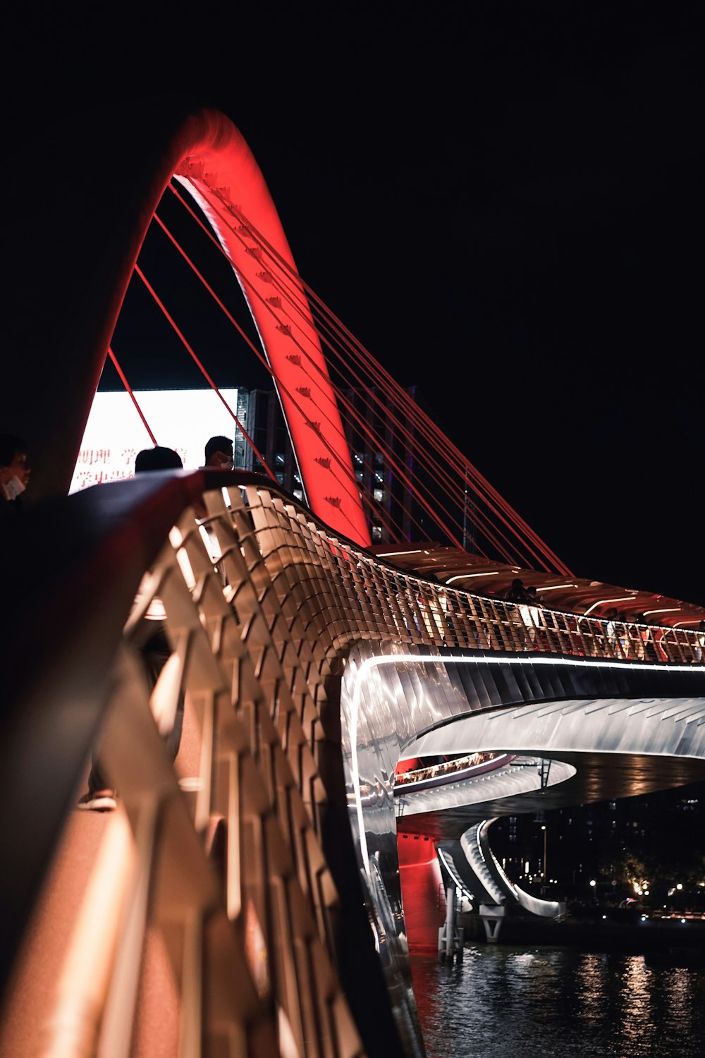 cars on bridge during night time