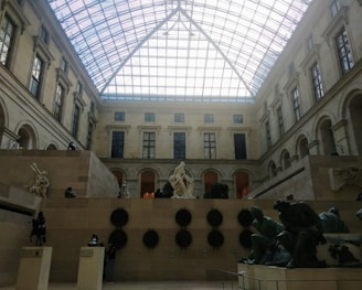 Elegant great room with museum-quality artwork and 15 clerestory windows flooding natural light.