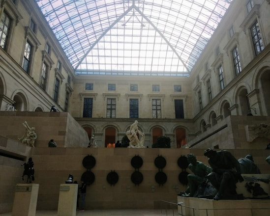 Elegant great room with museum-quality artwork and natural light streaming through clerestory windows.