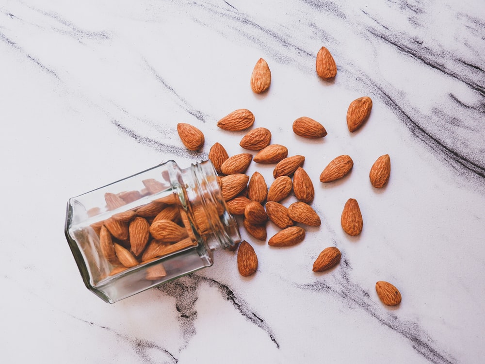 brown almond on white table