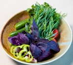 green vegetable on brown ceramic plate