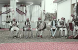 Local musicians playing traditional instruments during a festival in Burkina Faso.