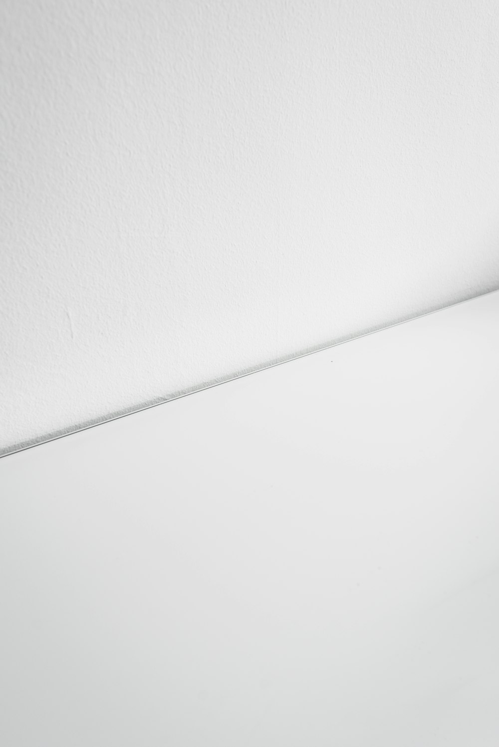 white wall paint with white paint