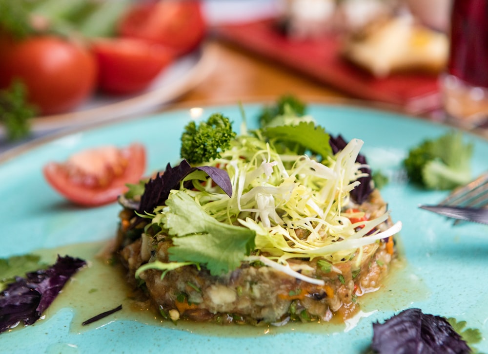 green vegetable on white ceramic plate