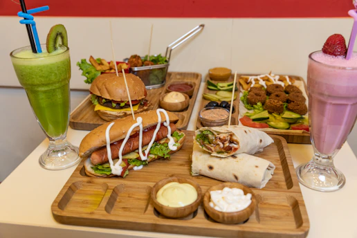 A vibrant spread of healthy office lunch options with colorful salads and sandwiches.