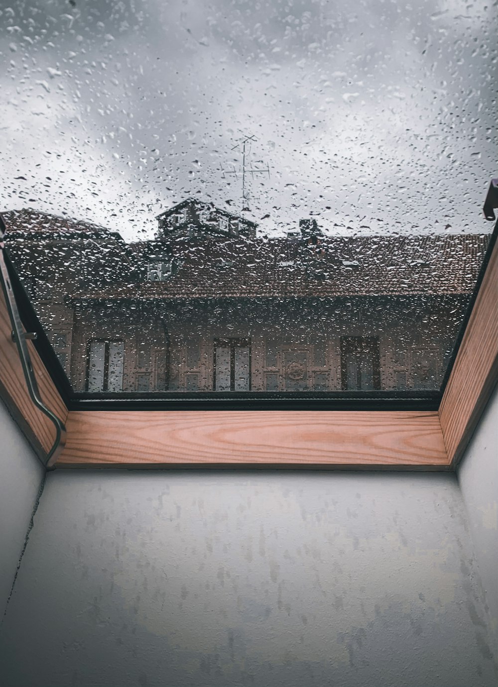 brown wooden framed glass window