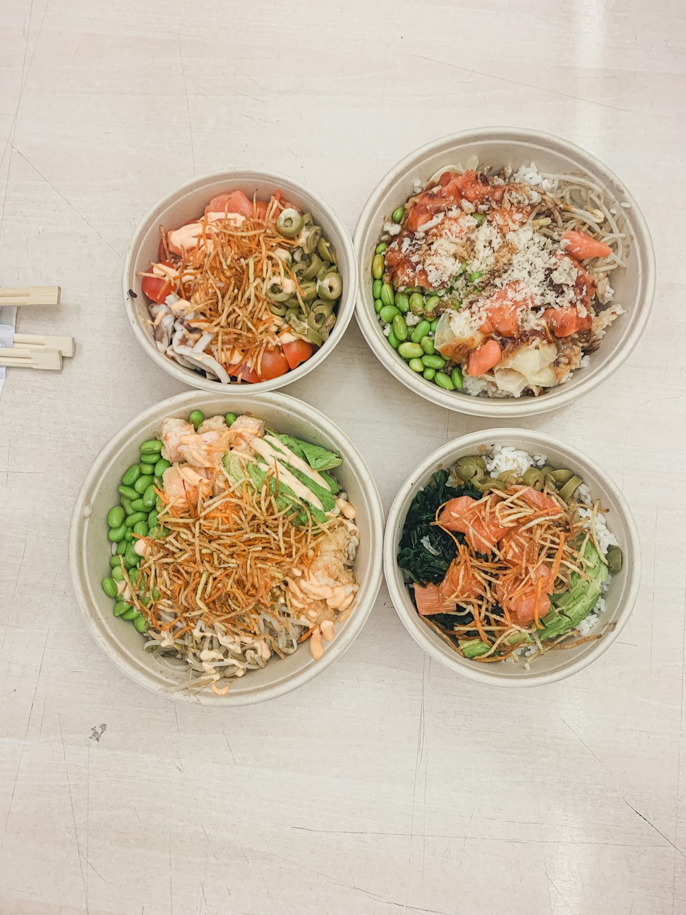 vegetable salad on white ceramic bowls