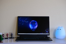 black and silver macbook pro