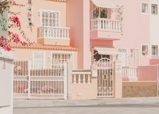 white and pink concrete building