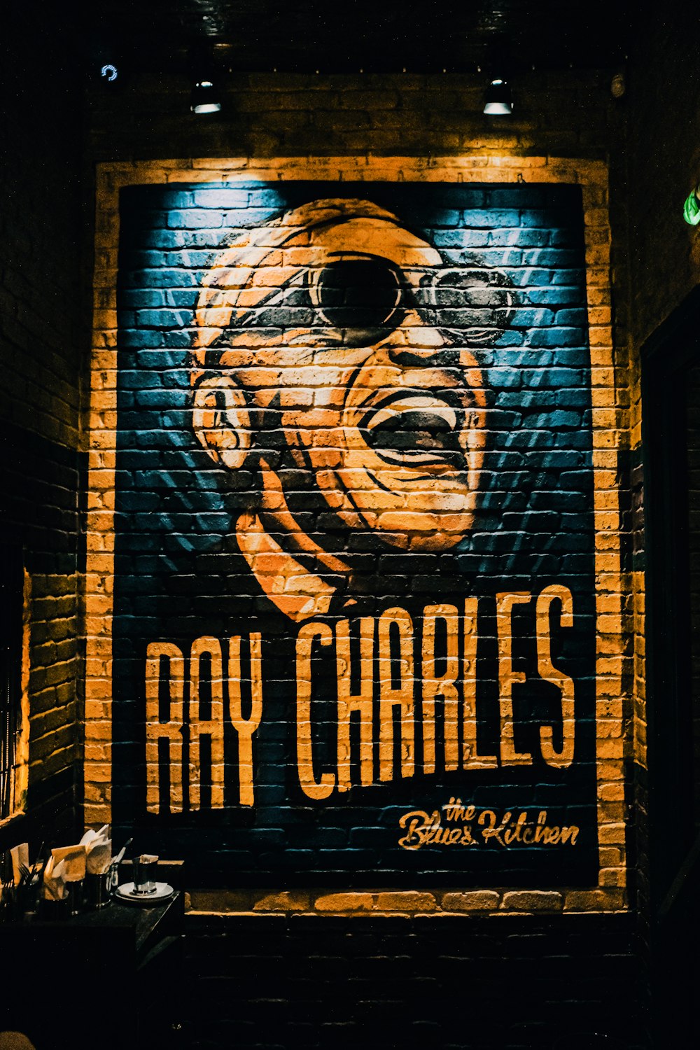 black and white skull with sunglasses and mustache graffiti