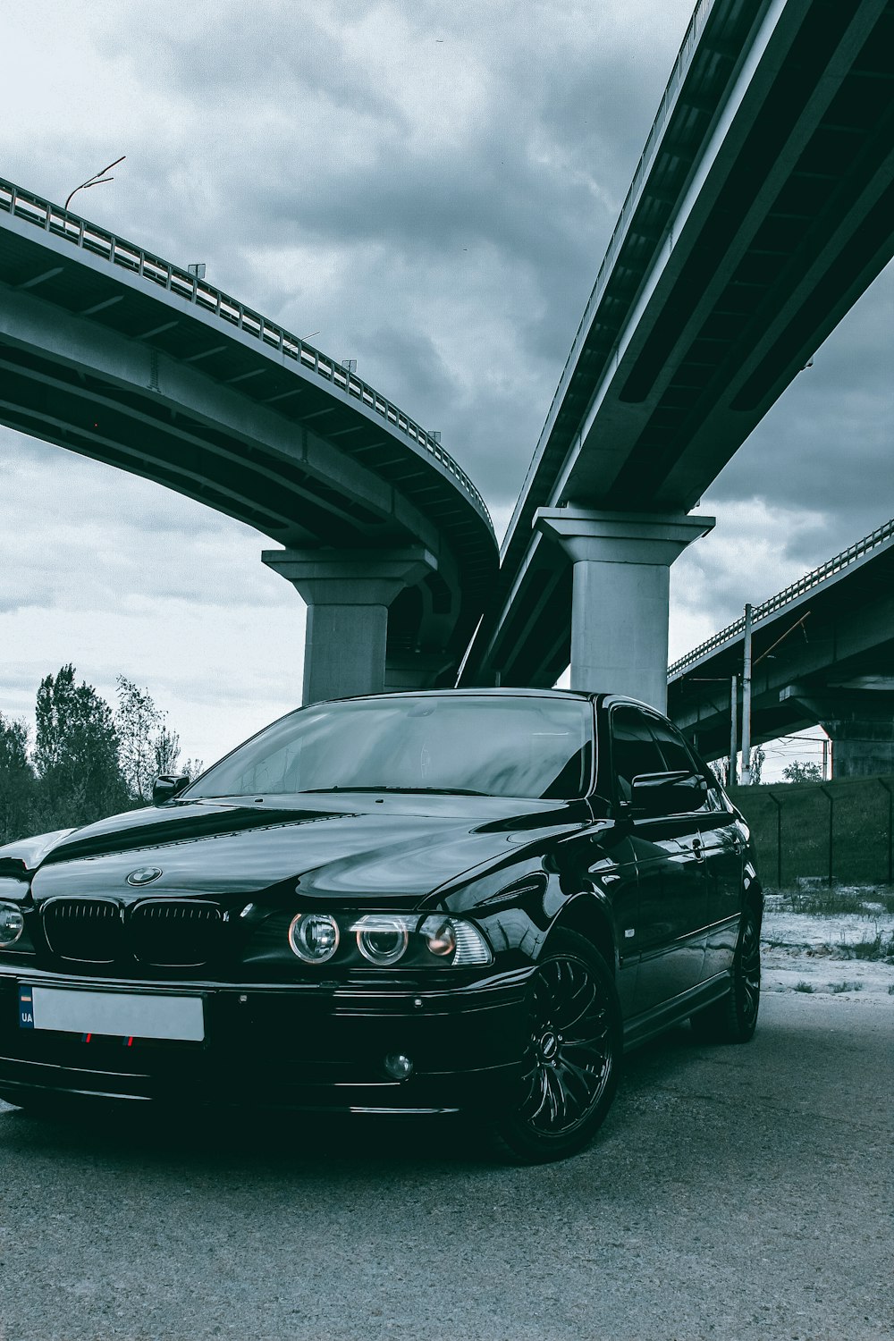 grayscale photo of black bmw car