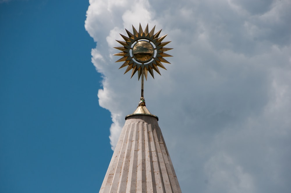 low angle photography of white and gray tower