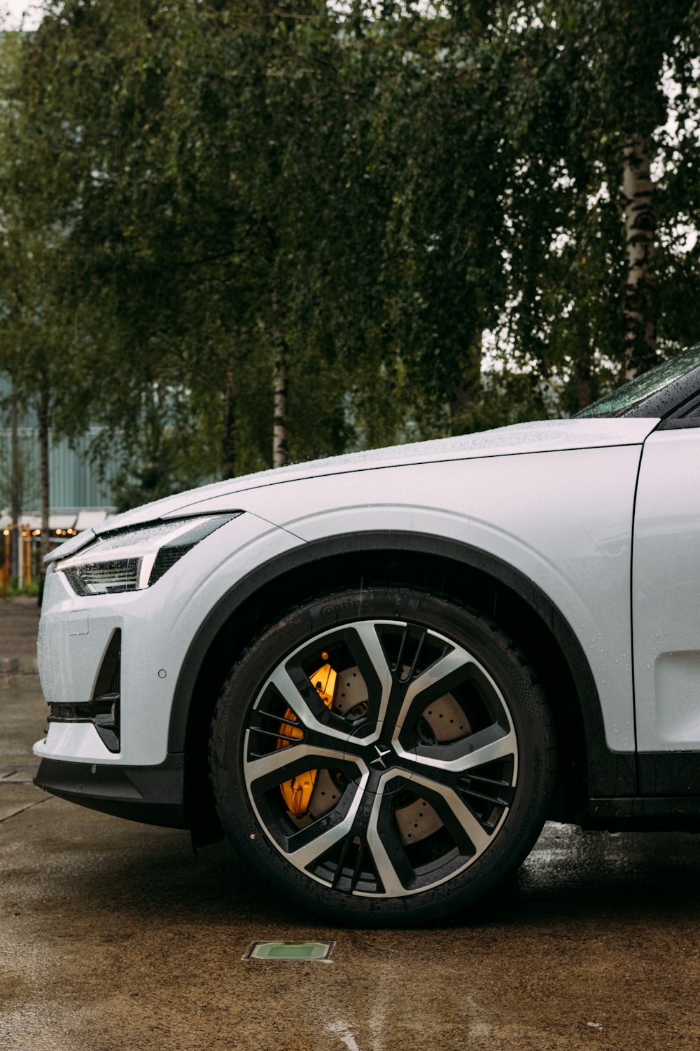 white car with black 5 spoke wheel